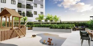 Amplo playground com áreas de descansos com mesas e cadeiras no Join Vila Mariana